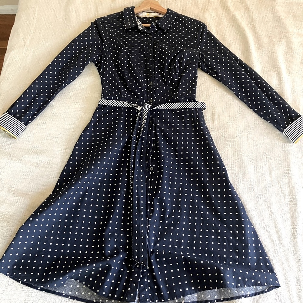 Long sleeved Navy polka dot dress with yellow trimmed sleeves